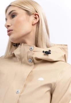 Schmuddelwedda RegenImpermeabileBeige Donna Giacche E Blazer WD221U0K4-B11 -Schmuddelwedda 7506dcfd93224f5b84881b726aaff05a scaled